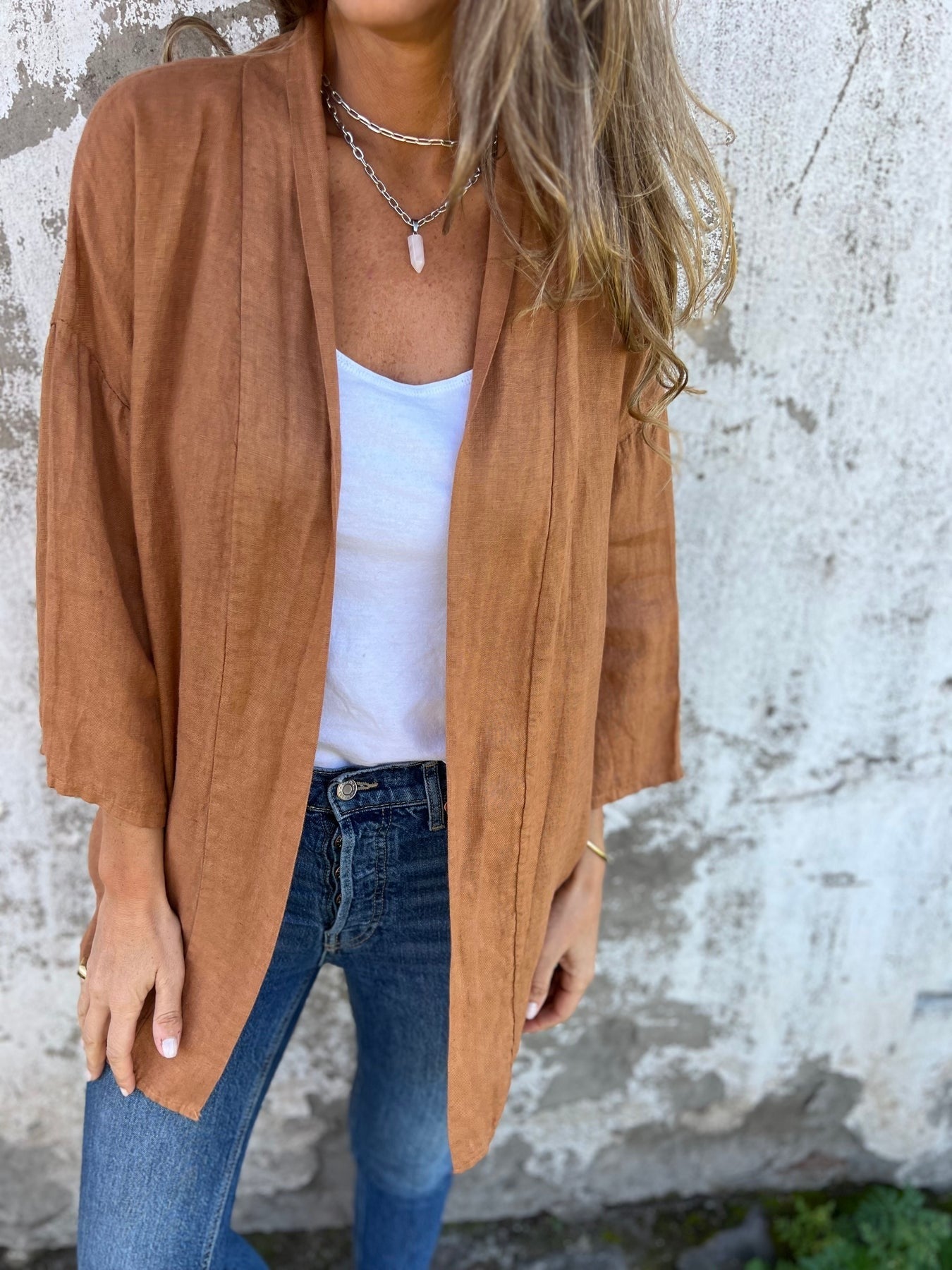 Mira Strikkegenser i lin med volanger