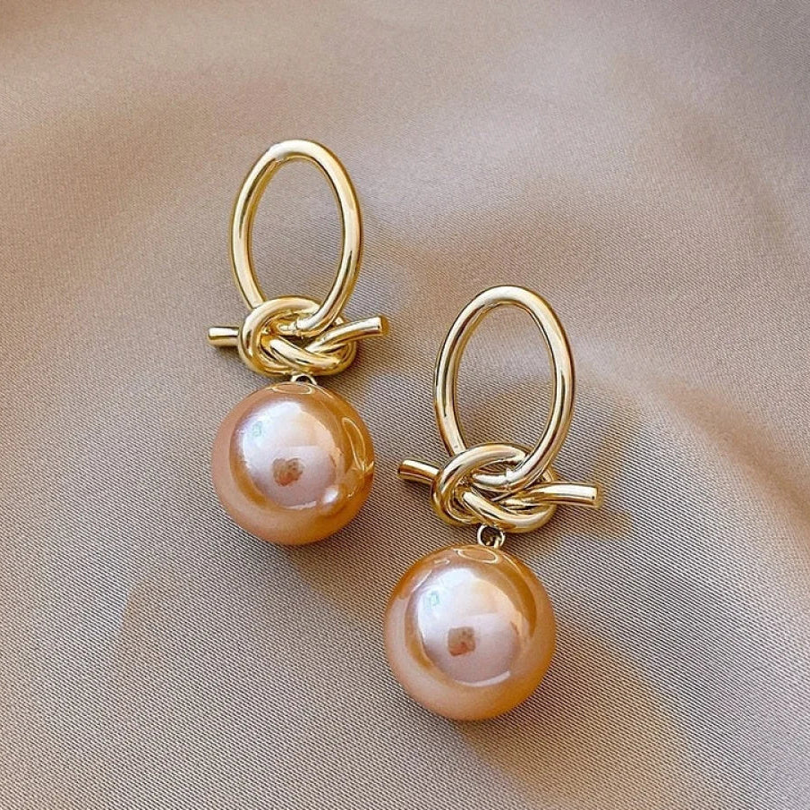 Kallie – Elegant Stenøreringer