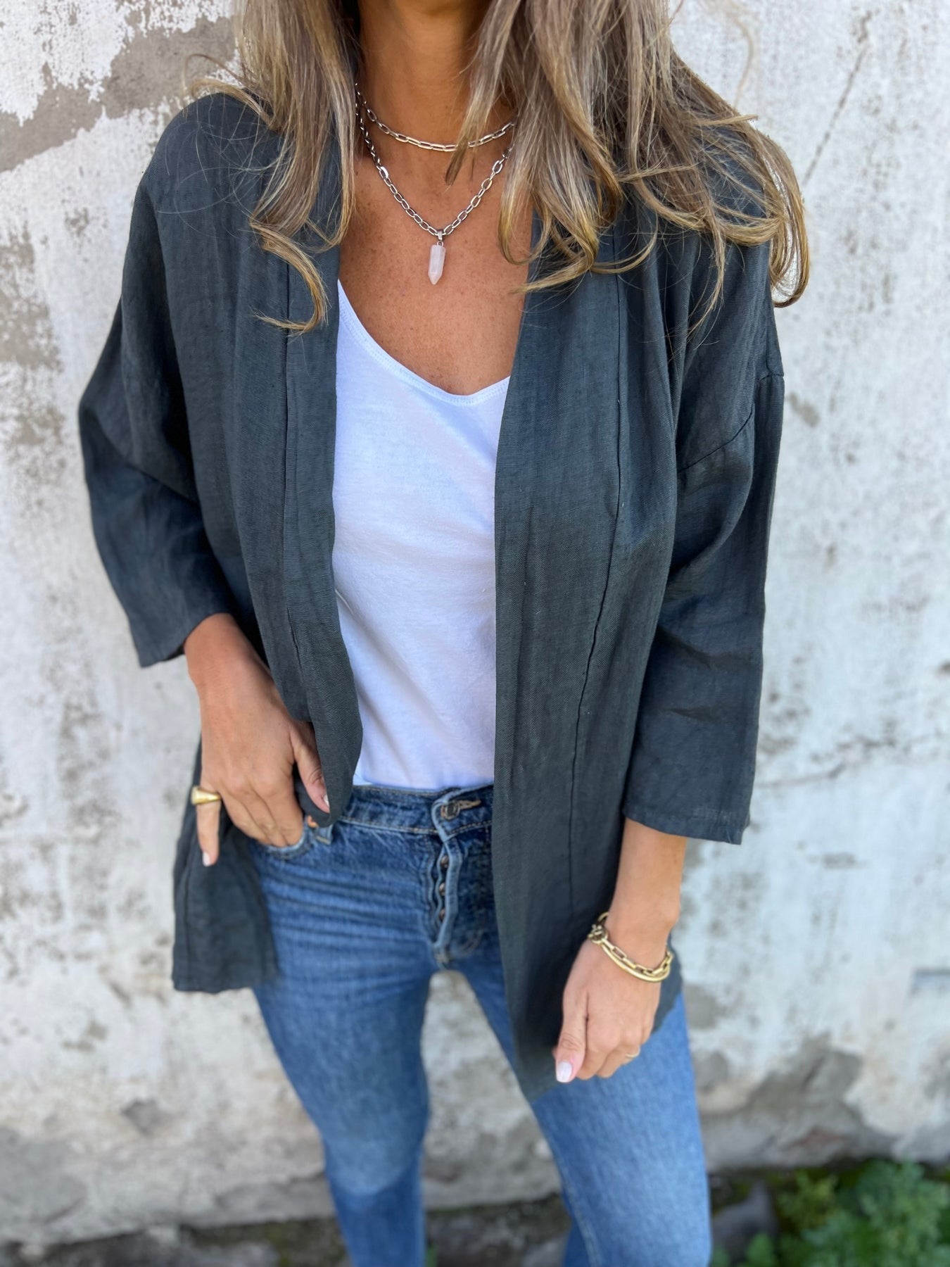 Mira Strikkegenser i lin med volanger